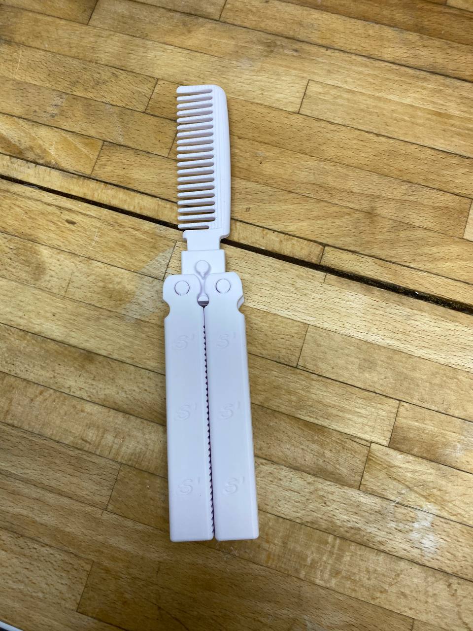 Butterfly Knife Comb